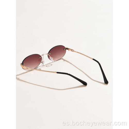 Moda Gafas de sol ovaladas sin marco europeas y americanas Gafas de sol de tendencia de color que cambian gradualmente para mujeres Gafas de sol de metal para hombres